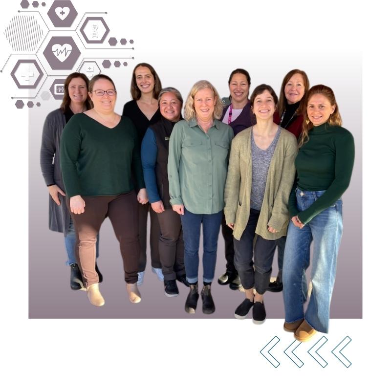 Group of women standing together against a light gray background with geometric patterns.